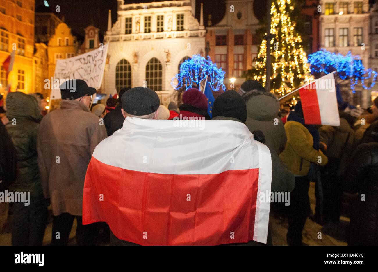Gdansk, Poland. 13th Dec, 2016. The Committee for the Defence of Democracy (KOD) movement protest outside the Law and Justice party hedquarter in Gdansk, and at the Dlugi Targ street in Gdansk called " Citizens Strike ". Protesters demand resignation of the government of the PM Beata Szydlo, inhibition unprepared and politicization of education reform and the introduction of real chapter of the State of the Church Credit:  Michal Fludra/Alamy Live News Stock Photo