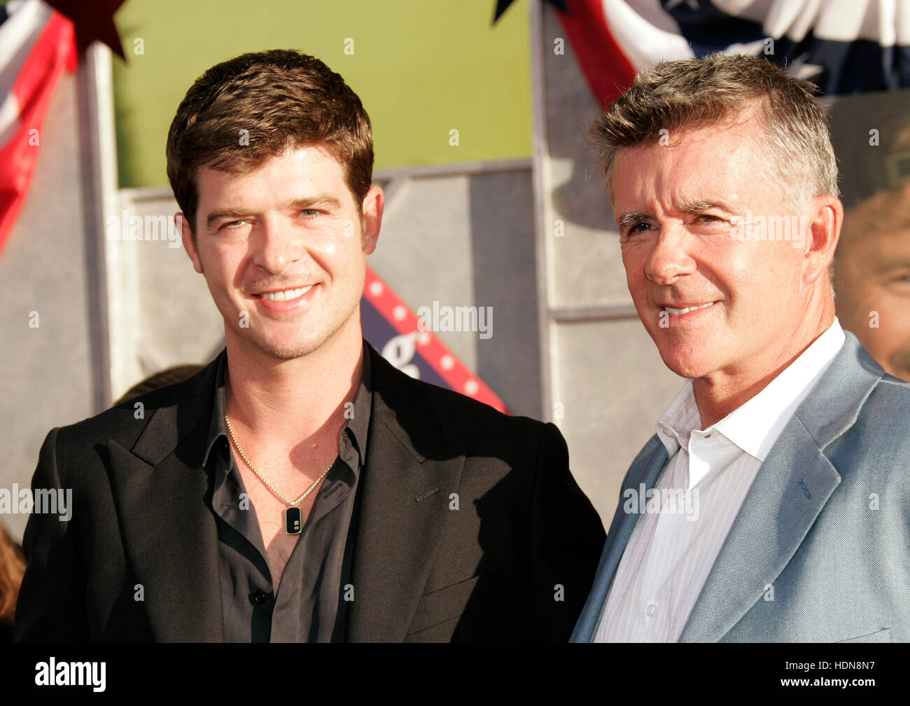 File. 13th Dec, 2016. ALAN THICKE (March 1, 1947 - December 13, 2016) was a Canadian actor, songwriter, and game and talk show host. He is known for his role as Jason Seaver, the father on the ABC television series Growing Pains. His son is the singer R. Thicke. Alan, died at age 69, of a heart attack while playing hockey with his 19 year-old son Carter Thicke. Pictured: Jul 24, 2008 - Hollywood, California, USA - Singer ROBIN THICKE and Dad ALAN THICKE arriving at the 'Swing Vote' World Premiere held at El Capitan Theater © Lisa O'Connor/ZUMAPRESS.com/Alamy Live News Stock Photo