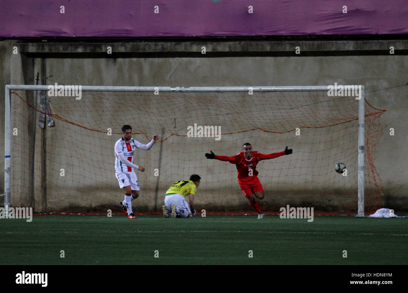 West Bank, West Bank, Palestinian Territory. 13th Dec, 2016. Palestino players and Chile players compete during their friendly soccer match between Palestine and CD Palestino at Nablus Stadium in The West Bank City of Nablus, 13 December 2016. CD Palestino visit West Bank and Gaza for the second time. The club was founded in 1920 by a group of Palestinian immigrants, and plays in the Primera Division of Chile © Nedal Eshtayah/APA Images/ZUMA Wire/Alamy Live News Stock Photo