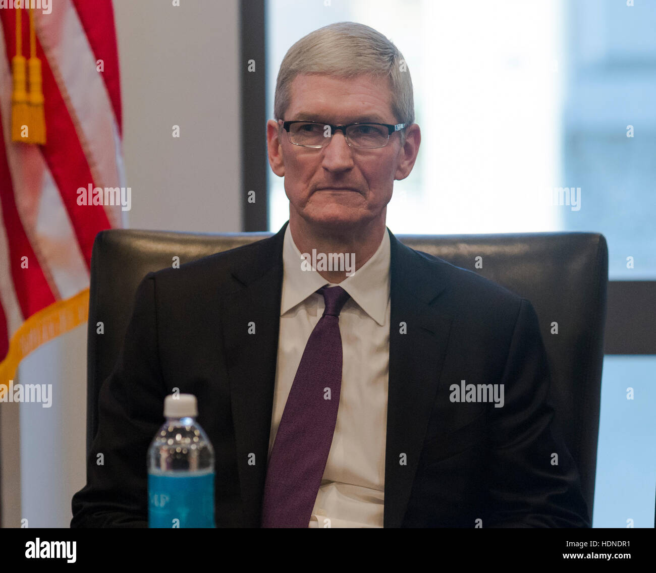 New York, USA. 14th December, 2016. Apple CEO Tim Cook is seen at a meeting of technology leaders in the Trump Organization conference room at Trump Tower in New York, NY, USA on December 14, 2016. Credit: Albin Lohr-Jones/Pool via CNP /MediaPunch Credit:  MediaPunch Inc/Alamy Live News Stock Photo