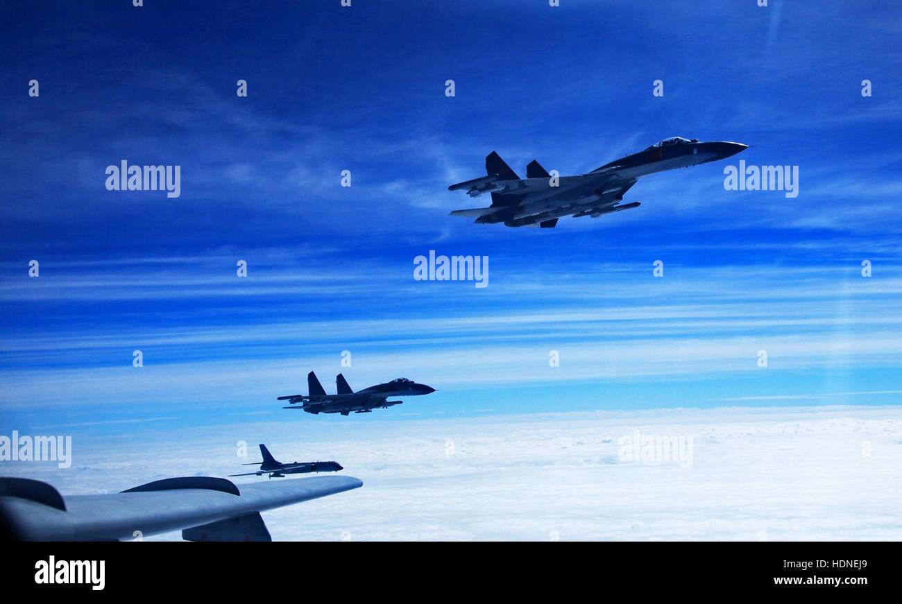 Beijing, China. 15th Dec, 2016. File photo shows Chinese Air Force aircrafts taking part in a high sea drill. Recent drills conducted by the Chinese Air Force on the high seas are regular, routine military activities, an air force spokesperson said Thursday. Credit:  Tian Ning/Xinhua/Alamy Live News Stock Photo