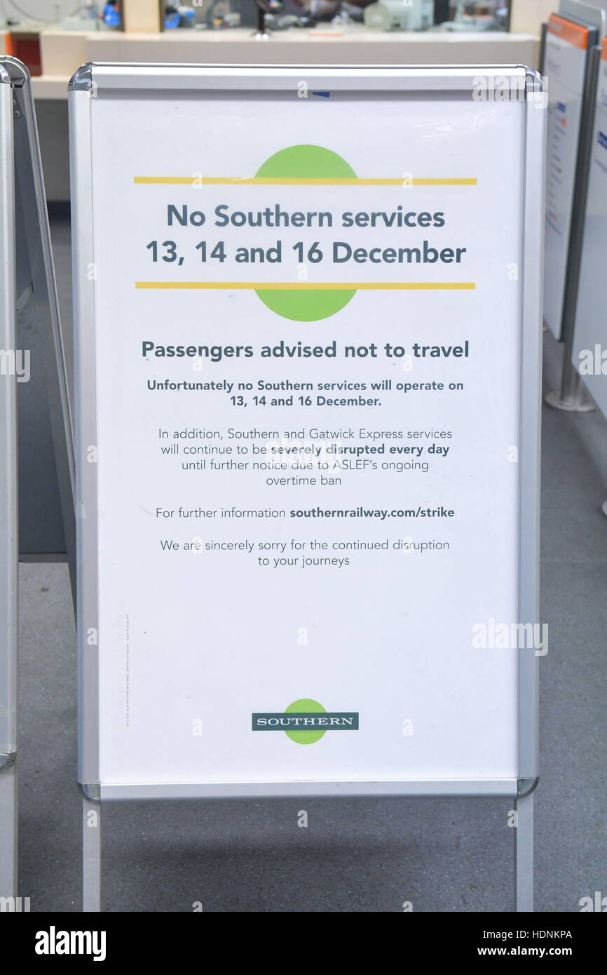 Signs warns passengers of disruption at New Cross Gate station in SE London as a strike by train drivers on Southern Railway, in a dispute over driver-only trains, crippled thousands of services caused misery for hundreds of thousands of passengers. Stock Photo