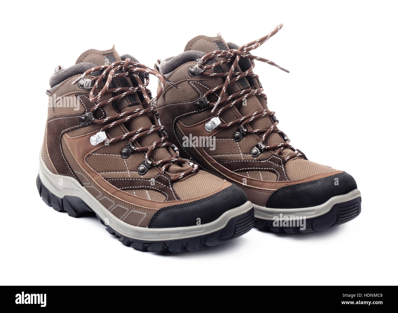 Pair of new hiking boots isolated on white background Stock Photo - Alamy