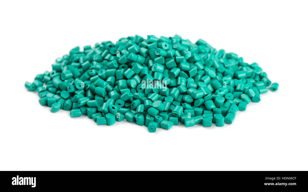 Pile of aquamarine plastic polymer granules isolated on white background Stock Photo