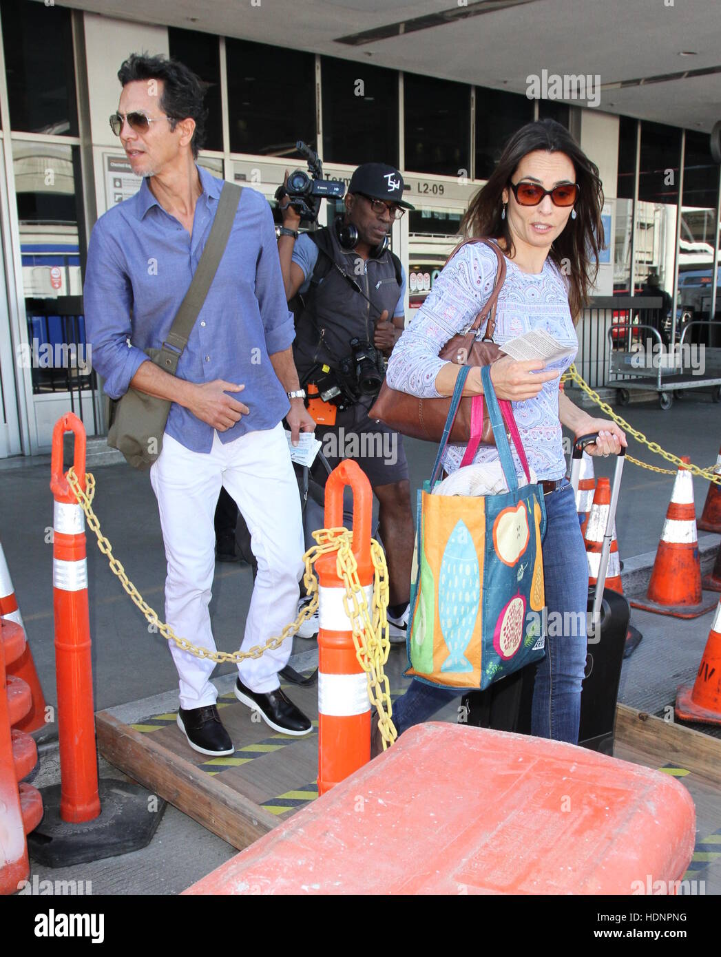 Benjamin Bratt and his wife Talisa Soto arrive at Los Angeles International Airport (LAX)  Featuring: Benjamin Bratt, Talisa Soto Where: Los Angeles, California, United States When: 21 Oct 2016 Stock Photo