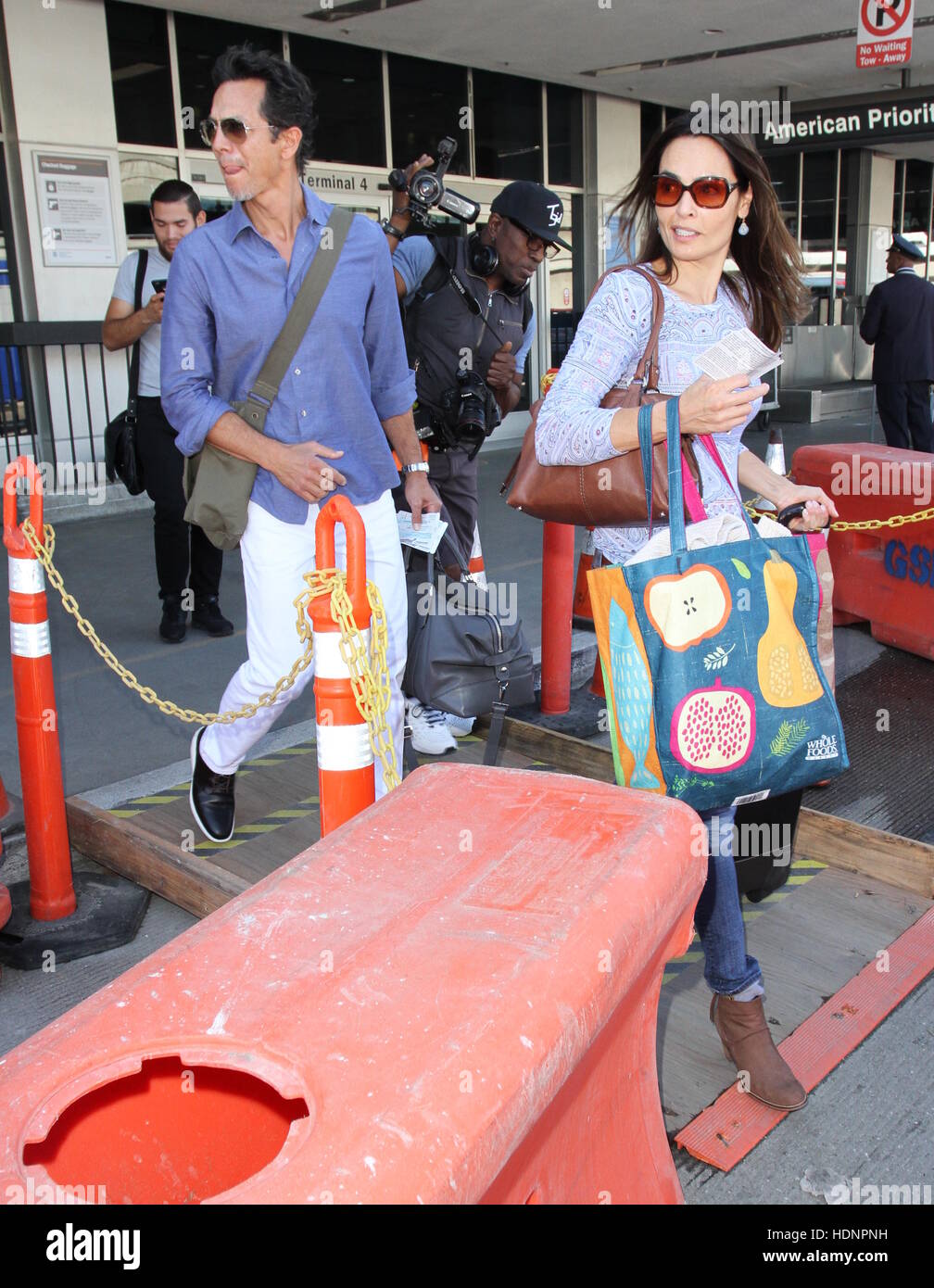 Benjamin Bratt and his wife Talisa Soto arrive at Los Angeles International Airport (LAX)  Featuring: Benjamin Bratt, Talisa Soto Where: Los Angeles, California, United States When: 21 Oct 2016 Stock Photo