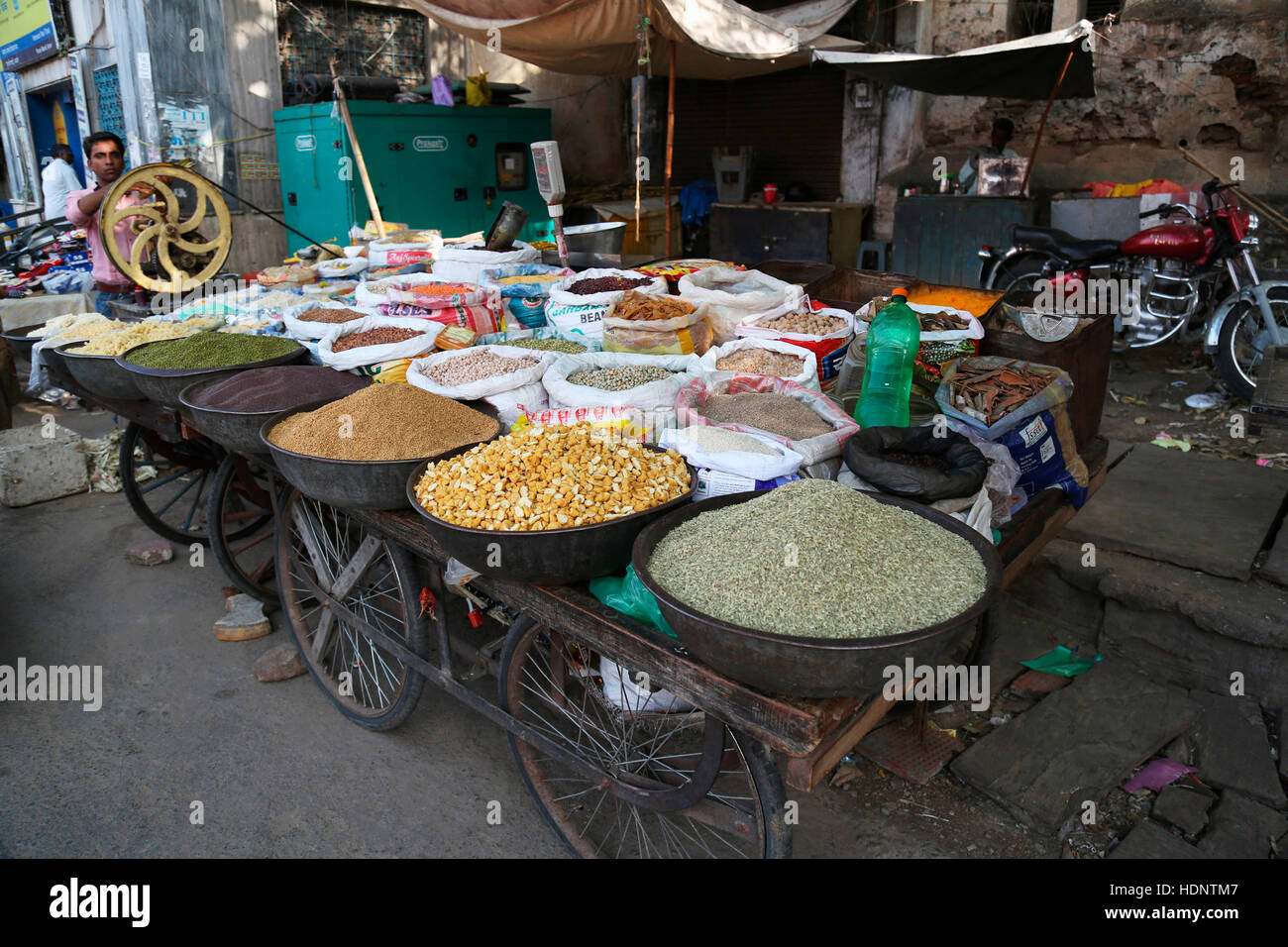 Indian Spices , Grains and Millets on a handcart for sale in the street market in Ajmer, Rajasthan, India Stock Photo