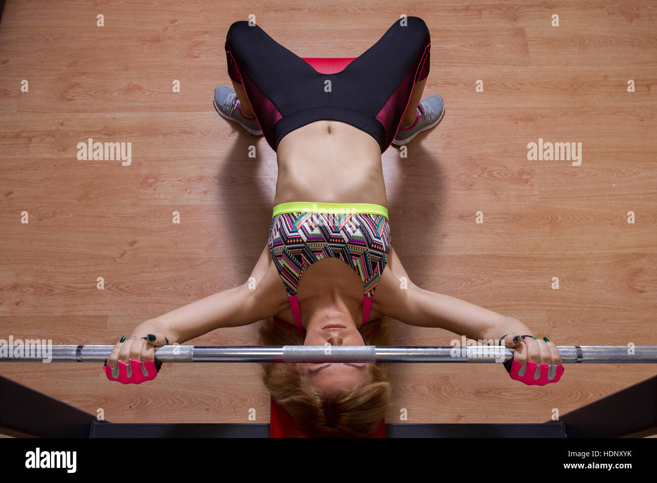 Sports workout in gym, blond girl training in gym Stock Photo