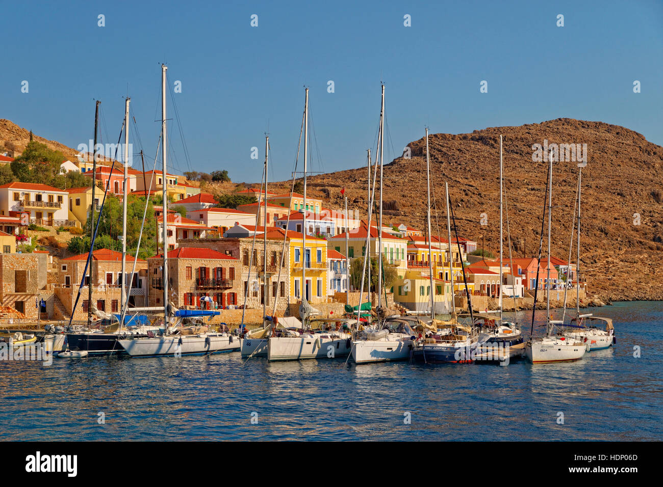 Yacht berths at Chalki town, Greek island of Chalki situated off the north coast of Rhodes, Dodecanese Island group, Greece. Stock Photo