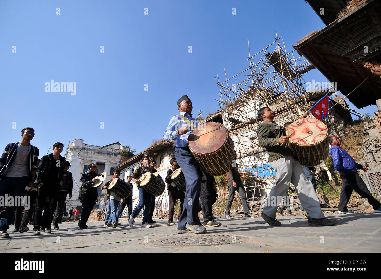 Kathmandu, Nepal. 13th Dec, 2016. People from Newar community play traditional instruments during a parade of Yomari Punhi and 13th National Jyapu Diwas, the Newari society organised a rally across the Basantapur Durbar Square, Kathmandu, Nepal on Tuesday, December 13, 2016. The rally reflected several culture and tradition of Newar society. Jatras and festivals are part of life for Newar community. Credit:  Narayan Maharjan/Pacific Press/Alamy Live News Stock Photo