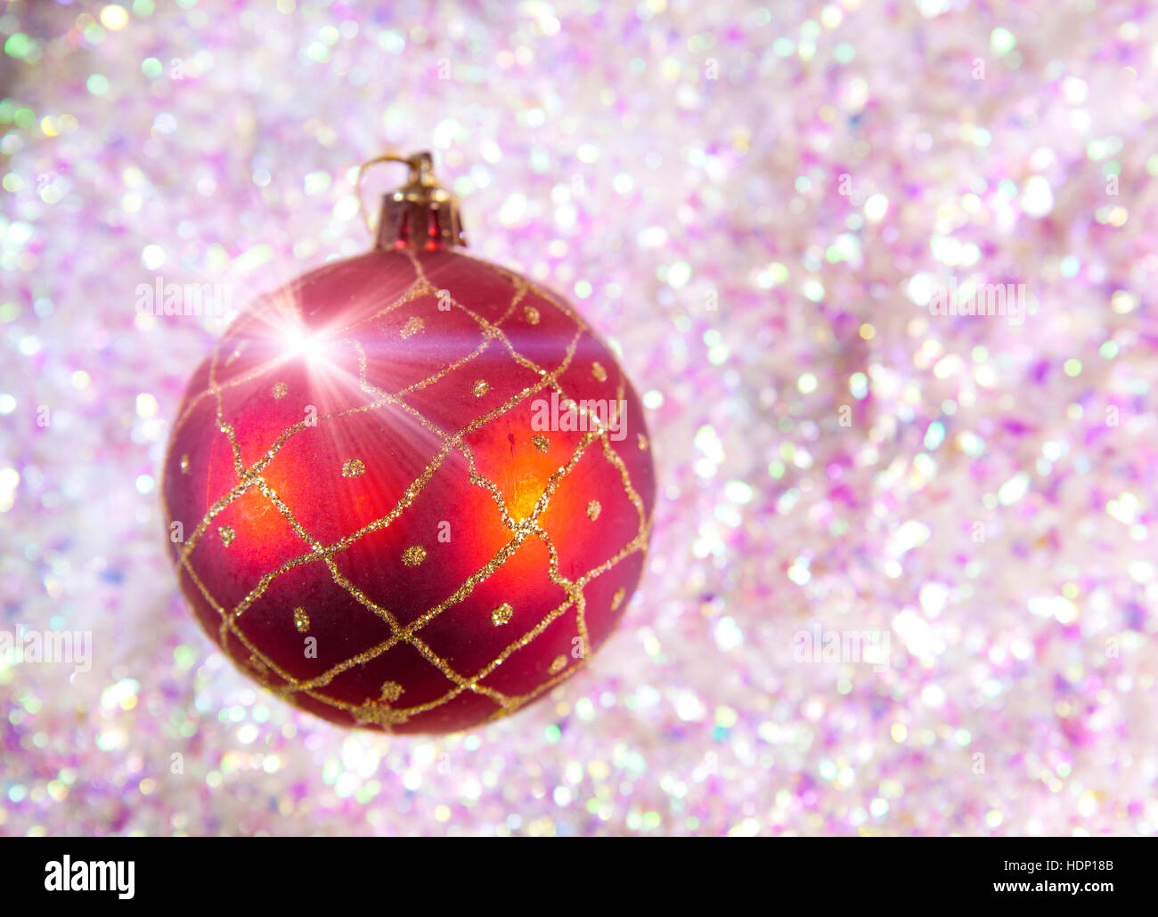 New Year's ball on a background of decorative snow Stock Photo