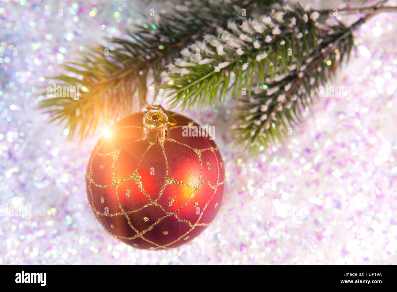 New Year's ball on a background of decorative snow Stock Photo