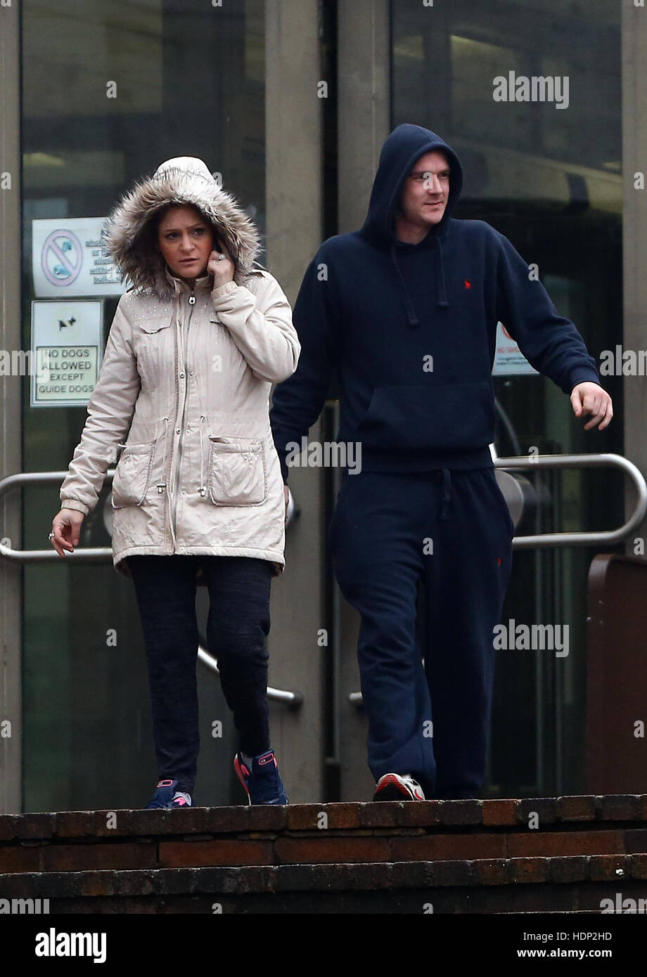 Katherine Cox (left) and Danny Shepherd leave Maidstone Crown Court after appearing charged with causing or allowing the death of a baby. Stock Photo