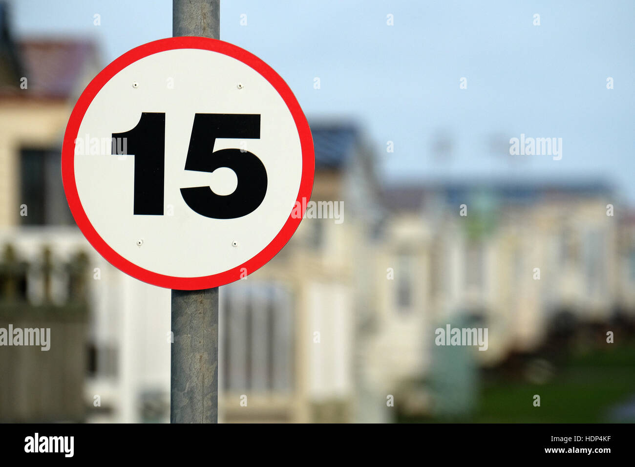 Fifteen miles per hour restriction sign. Stock Photo
