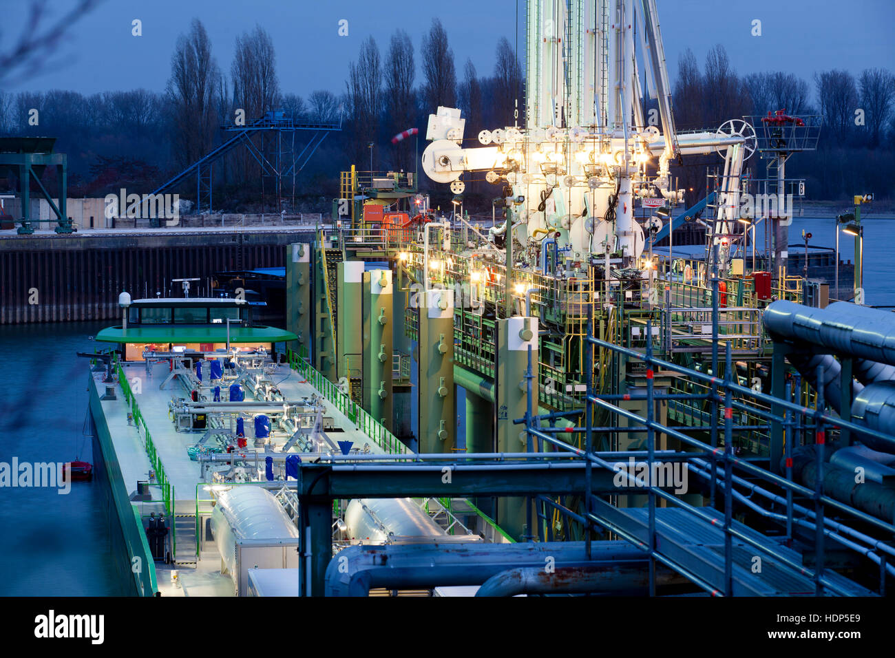 Germany, Cologne, harbor Cologne-Godorf, tanker at a loading plant for flammable liquid goods Stock Photo