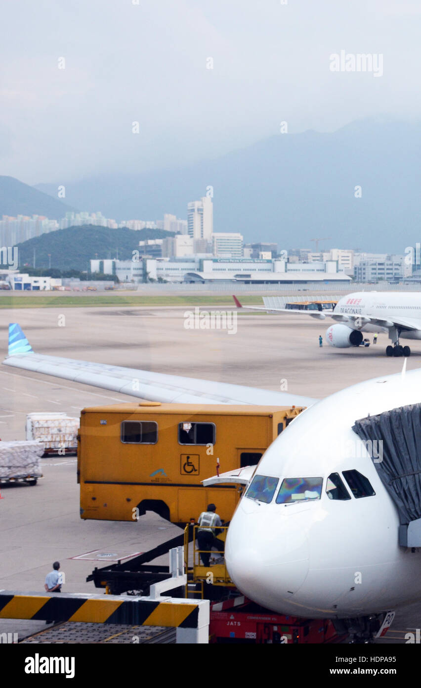 Physically disabled plane accessibility platform Hong Kong international airport Stock Photo