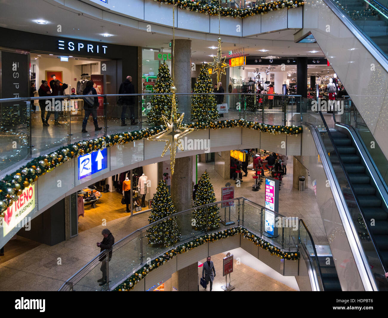 Inside City Point shopping centre decorated for Christmas Nuremberg Bavaria Germany EU inviting for retail therapy bright shopping experience Stock Photo