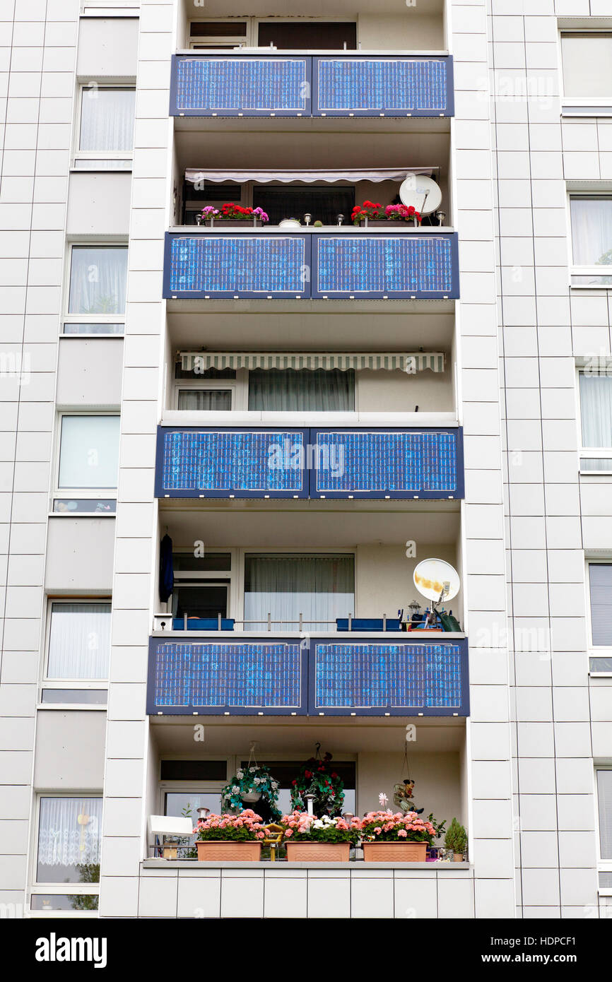 Germany, Cologne, solar energy housing estate in Cologne-Bocklemuend, solar modules at the balcony balustrades. Stock Photo