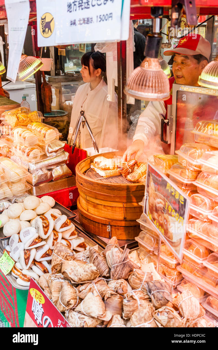 Japan, Kobe, Nankinmachi, Chinatown. Chinese food stall counter, Pork Belly buns being steamed