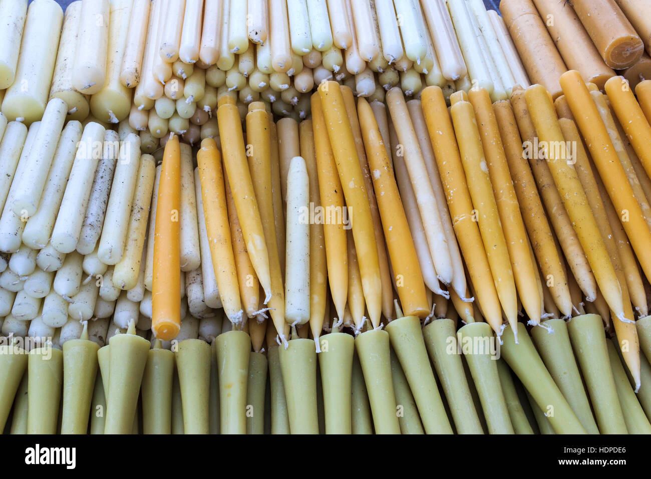 Close up of period tallow candles at a Victorian themed festival in Granary Square, King's Cross, London, UK Stock Photo