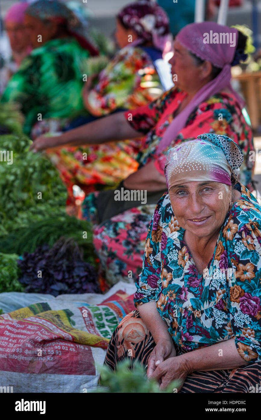 Women selling vegetables in the Siab Bazaar in Samarkand, Uzbekistan. Stock Photo