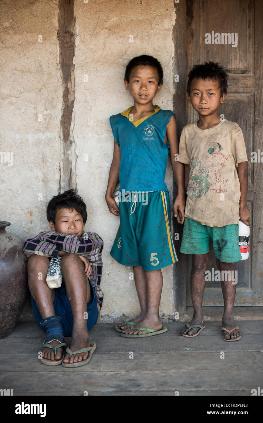 Three Burmese kids in the Kayah State,  Myanmar. Stock Photo