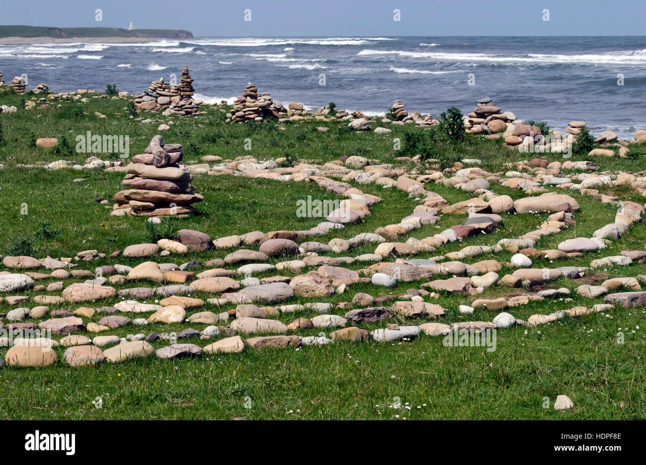 Pebble circles (labyrinth) near the beach at Lindisfarne (Holy) Island in Northumberland, England. Stock Photo