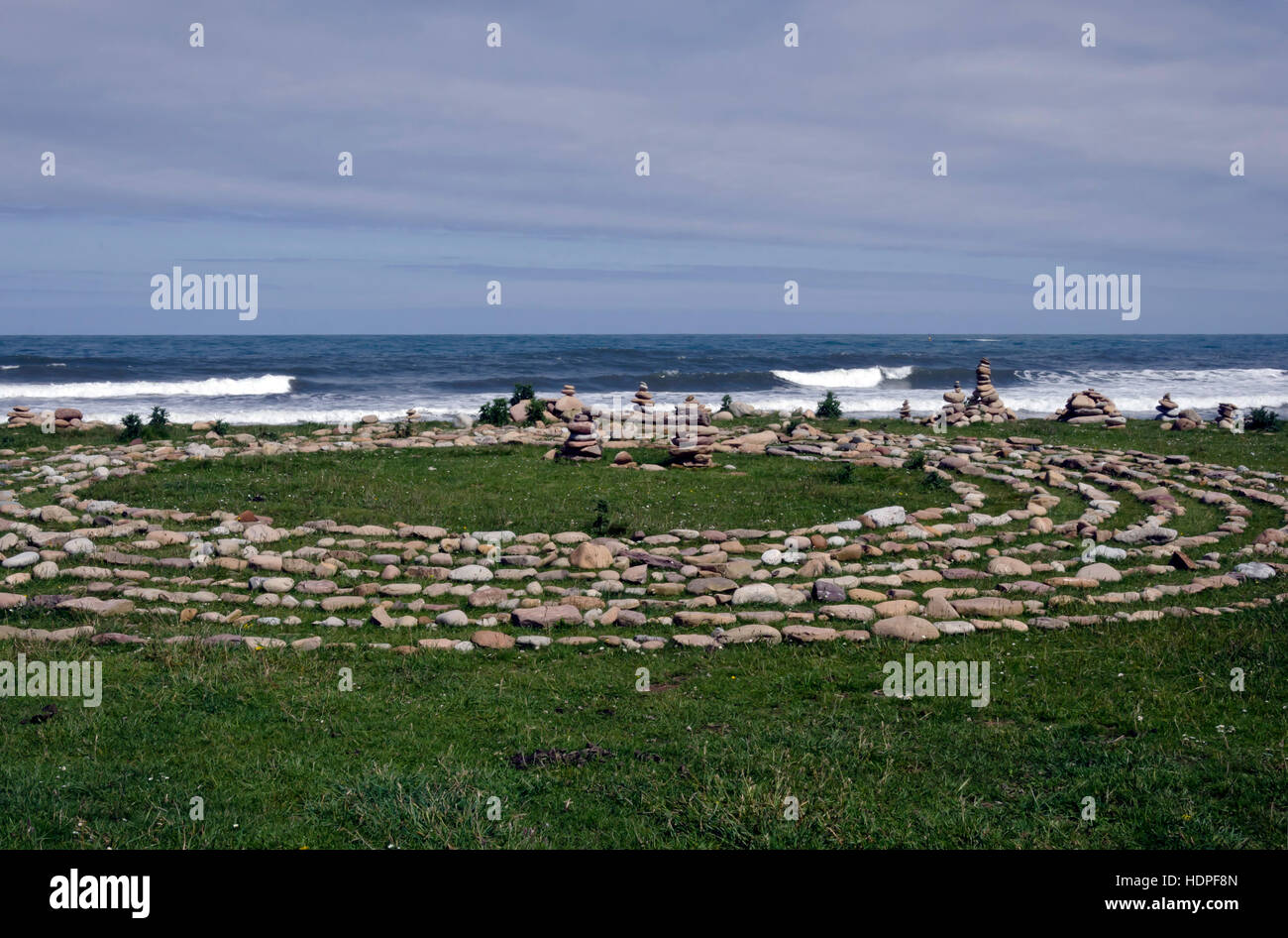 Pebble circles (labyrinth) near the beach at Lindisfarne (Holy) Island in Northumberland, England. Stock Photo