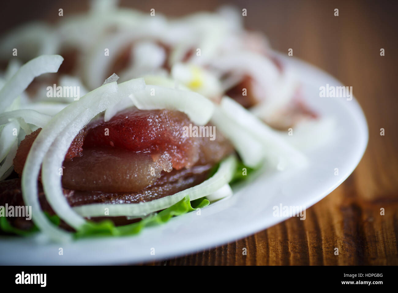 salted herring with onions Stock Photo Alamy