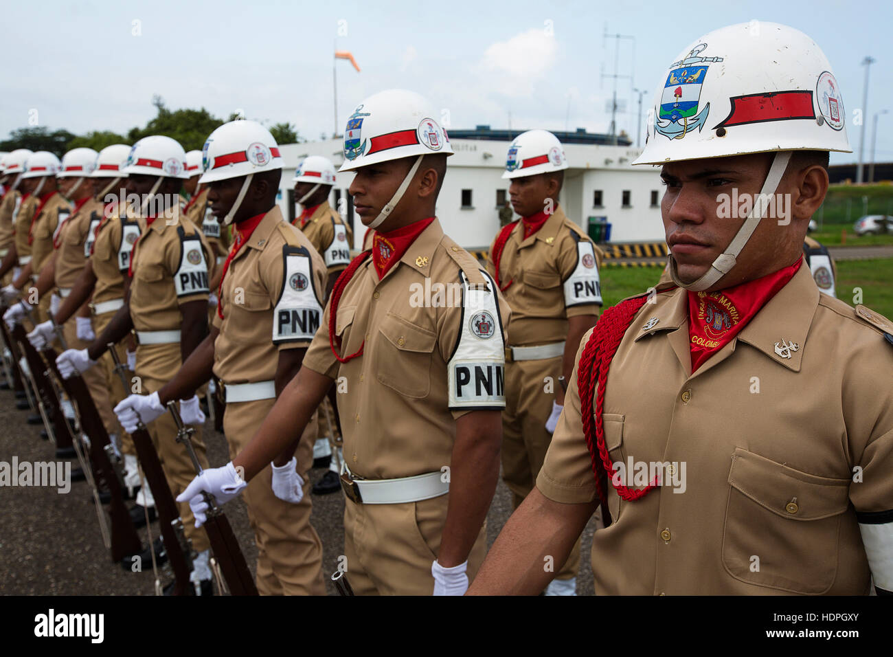Infanteria de Marina de Colombia soldiers stand in formation for the arrival of senior naval leaders for the Marine Leaders of the Americas Conference at the Marine Infantry Training Base August 27, 2015 in Covenas, Colombia. Stock Photo