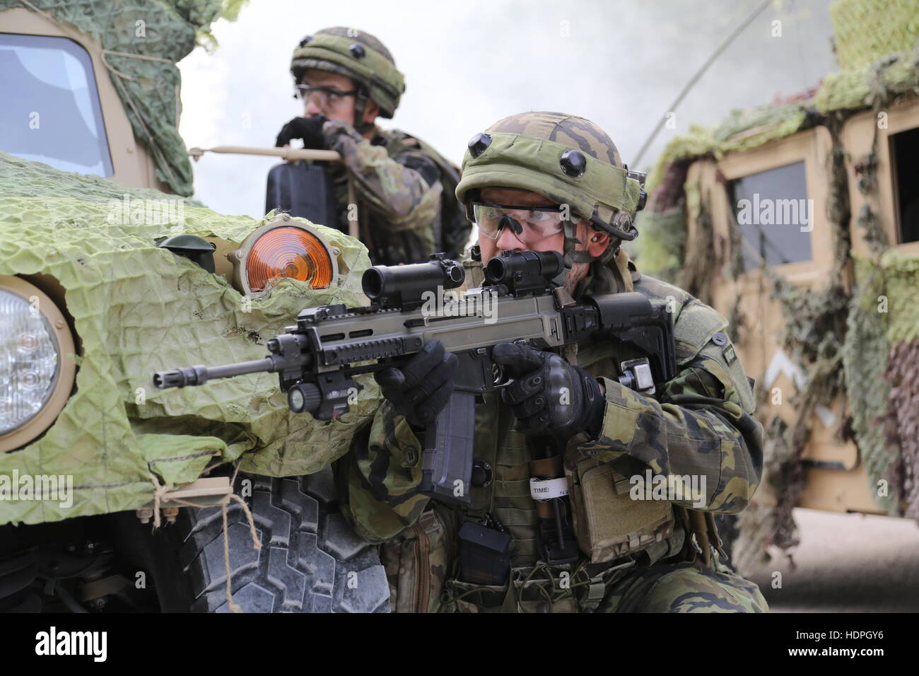 Czech soldiers provide security during an Allied Spirit II action training exercise at the Joint Multinational Readiness Center August 11, 2015 in Hohenfels, Germany. Stock Photo