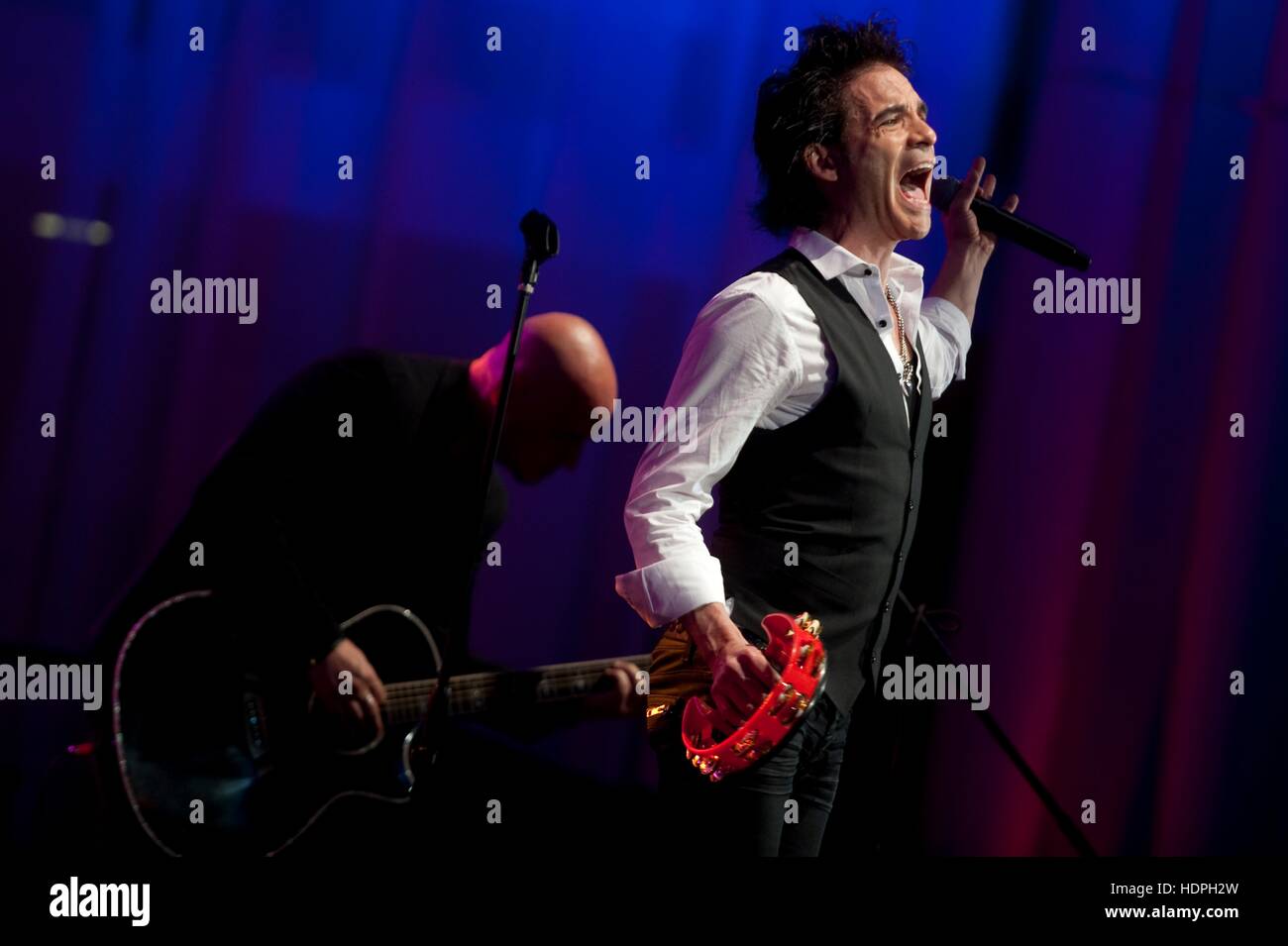 Rock band Train musicians Patrick Monahan (left) and Jimmy Stafford perform at the Stand Up for Heroes dinner at the Ronald Reagan Building June 16, 2011 in Washington, DC. Stock Photo