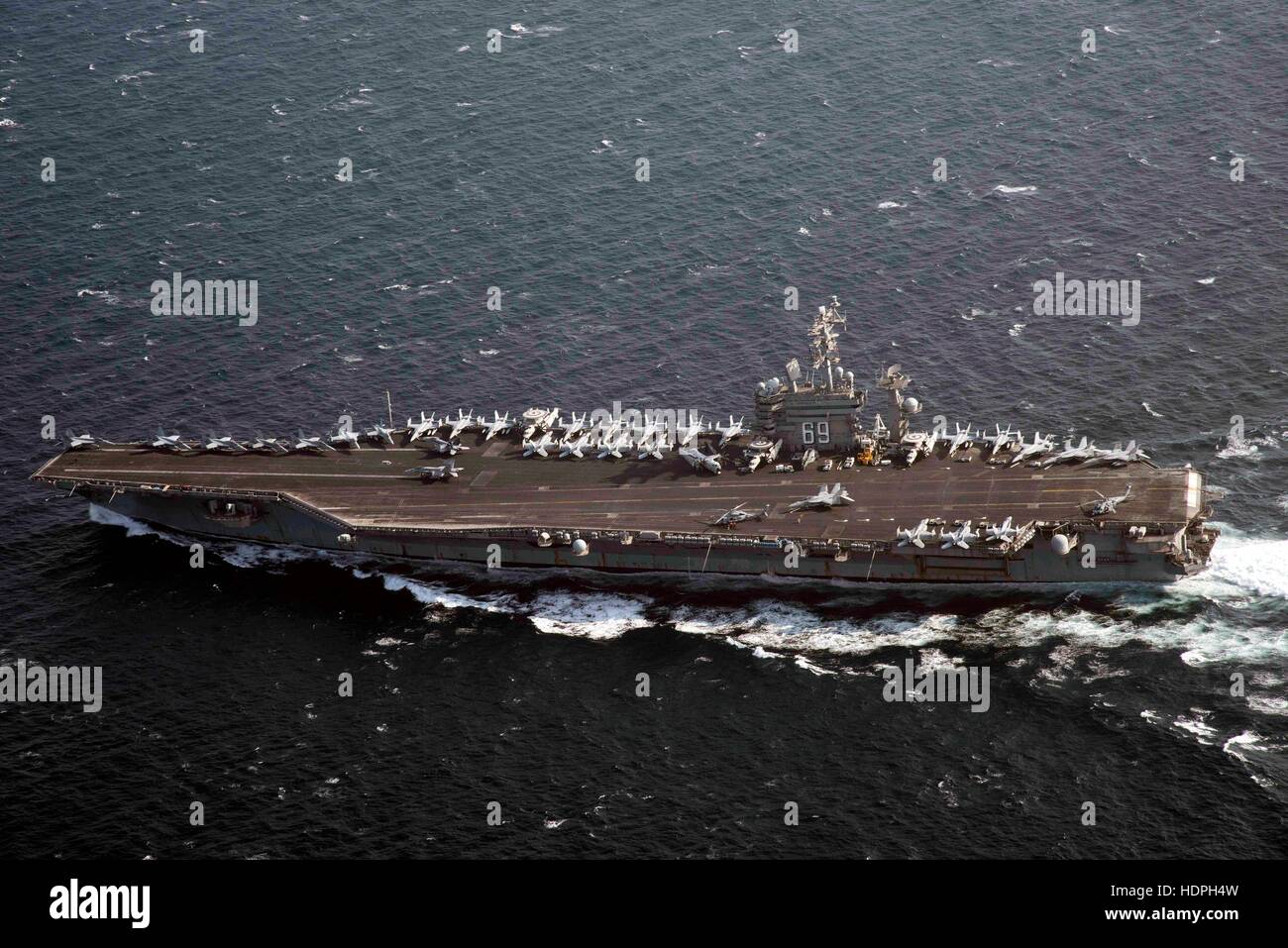 The USN Nimitz-class aircraft carrier USS Dwight D. Eisenhower steams underway November 29, 2016 in the Arabian Gulf. Stock Photo