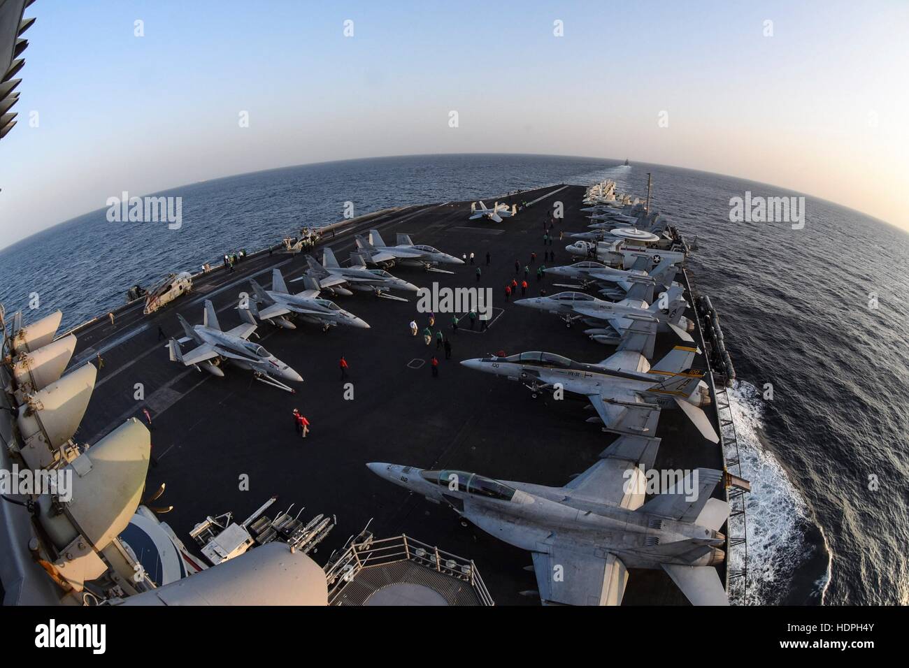 Aircraft line up on the flight deck of the USN Nimitz-class aircraft carrier USS Dwight D. Eisenhower while in transit November 26, 2016 in the Arabian Gulf. Stock Photo