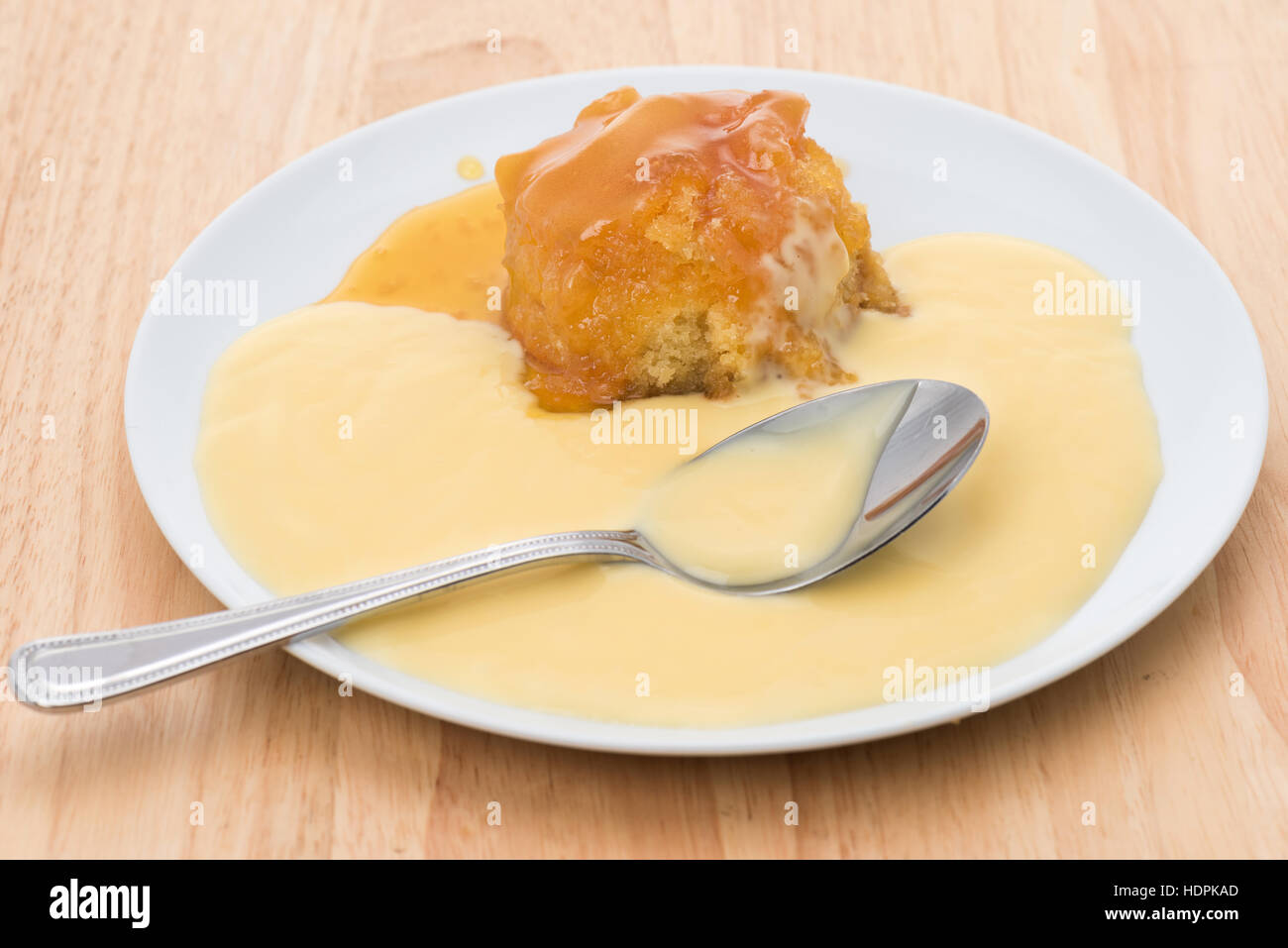 Syrup sponge and custard pudding Stock Photo