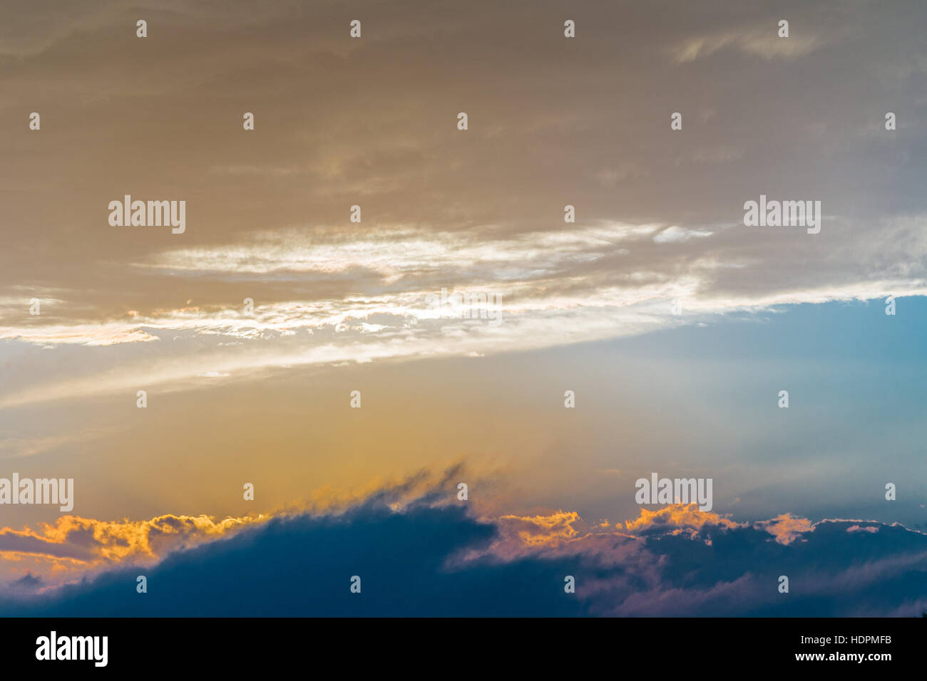 yellow sunset sky with clouds Stock Photo Alamy