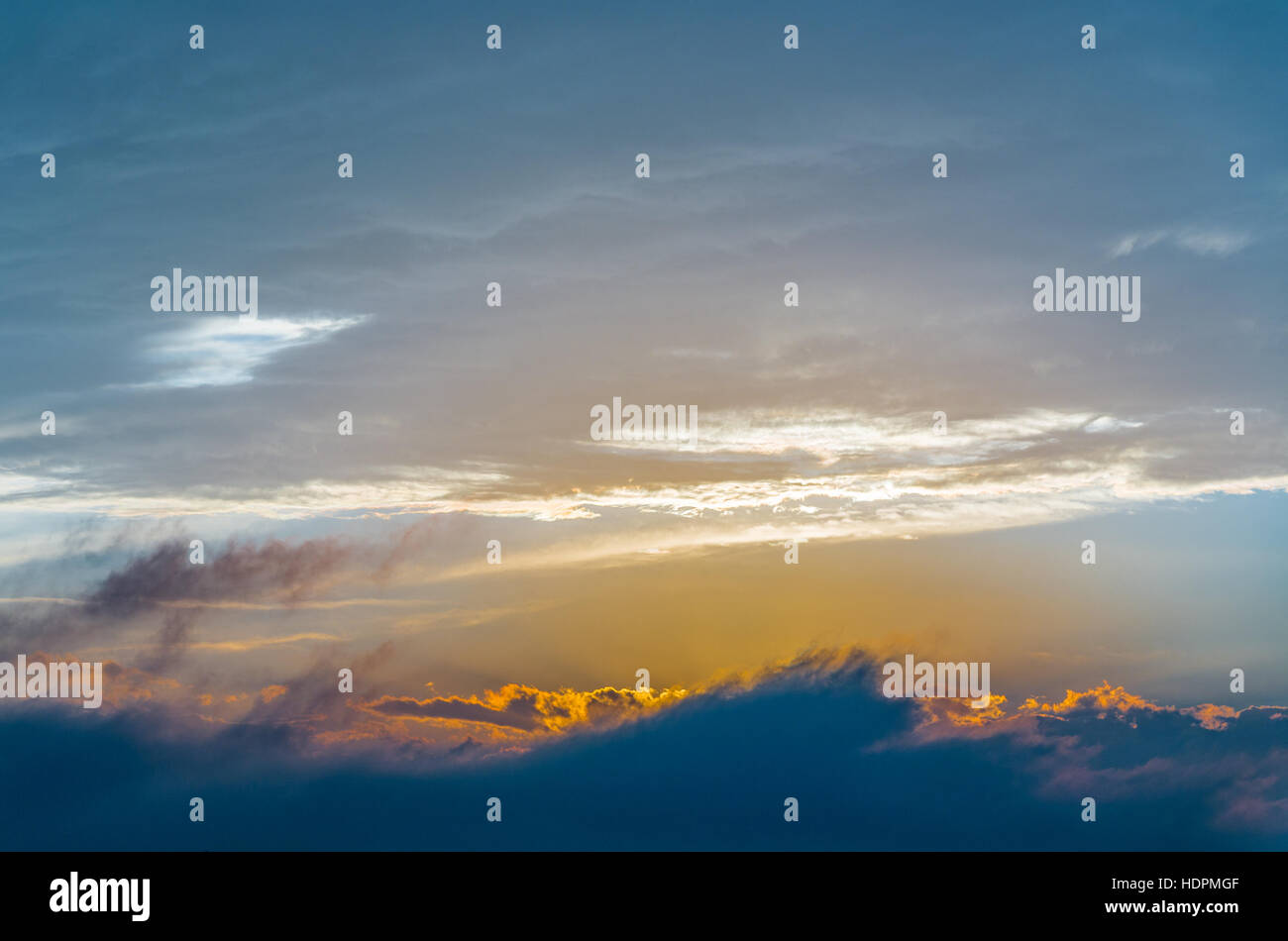 bright sunset sky with clouds Stock Photo - Alamy