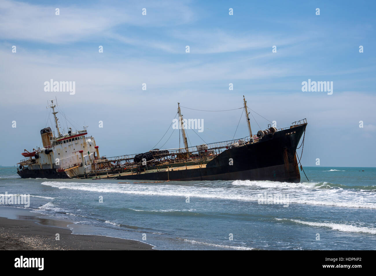Sunken boat at beach Stock Photo