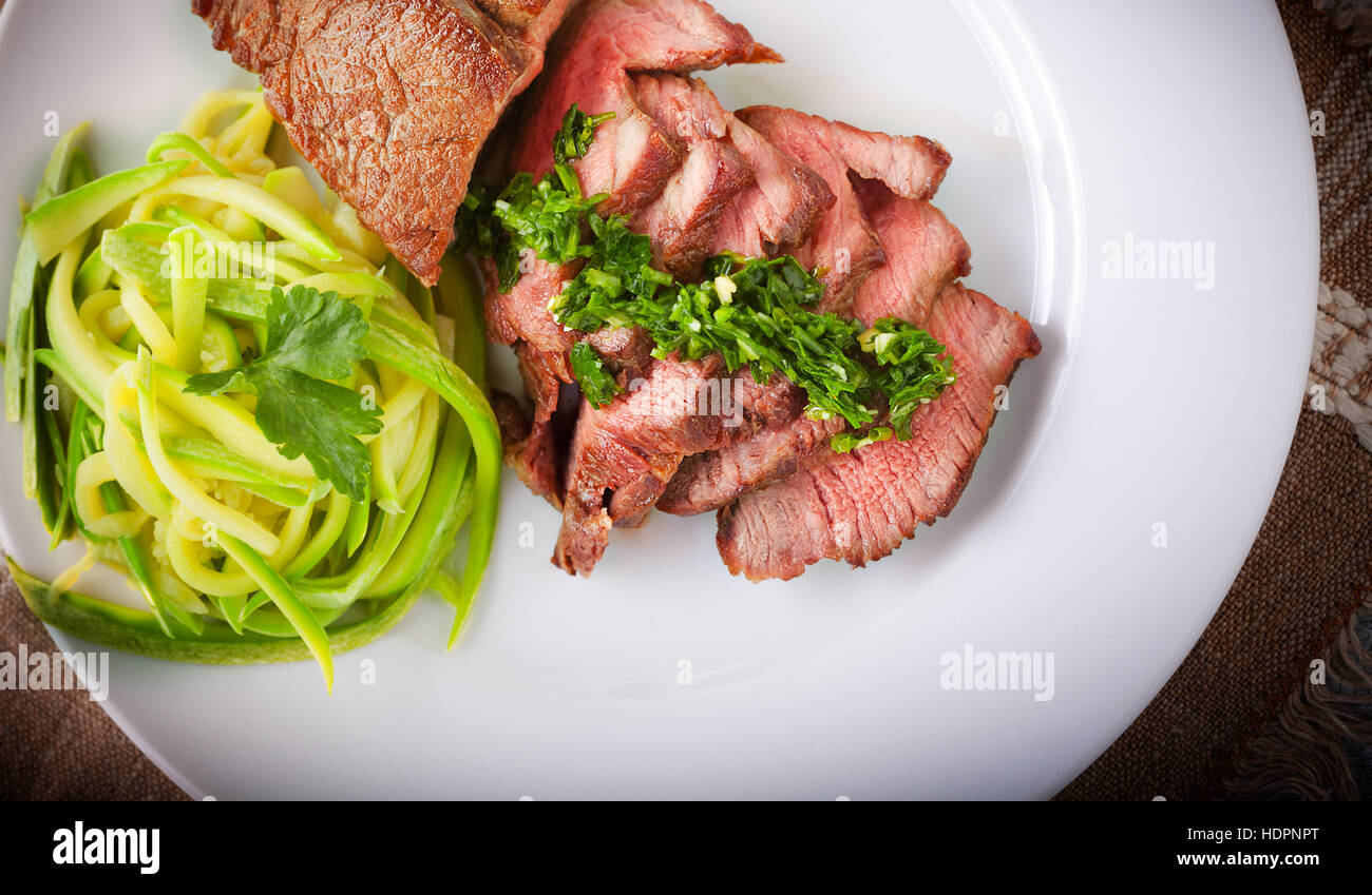 Zucchini pasta and meat Stock Photo