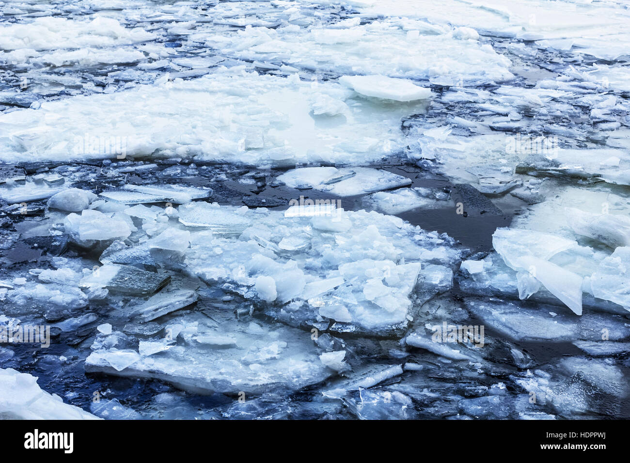 Pieces of ice in winter cold water Stock Photo - Alamy