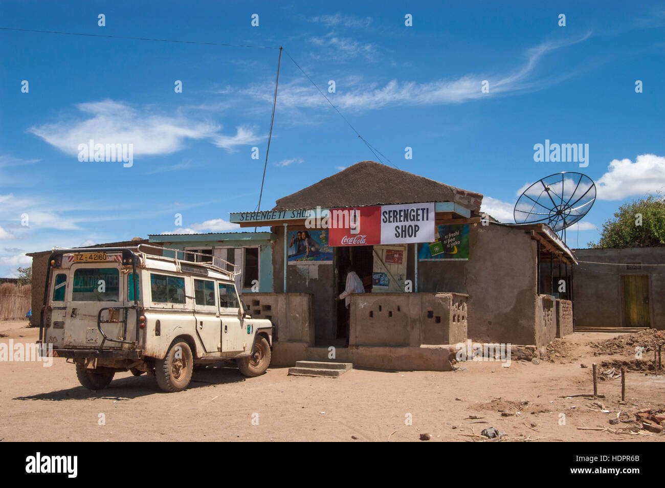 Groceries shop with jeep parked in front and satellite dish, Lake Eyasi, Manyara region, Tanzania Stock Photo