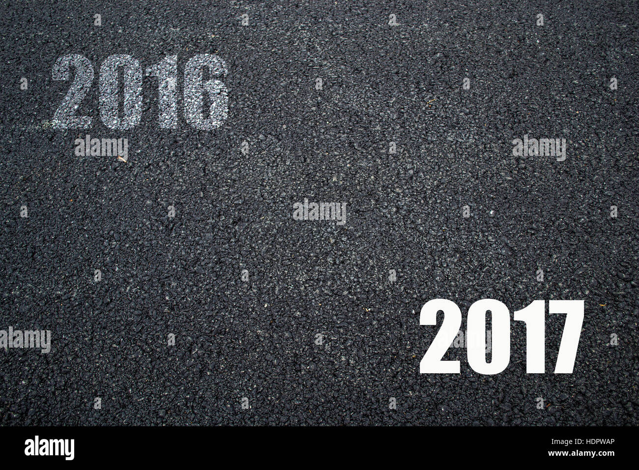 Good bye Old year 2016 and Happy New year 2017 on Asphalt Texture Background Stock Photo