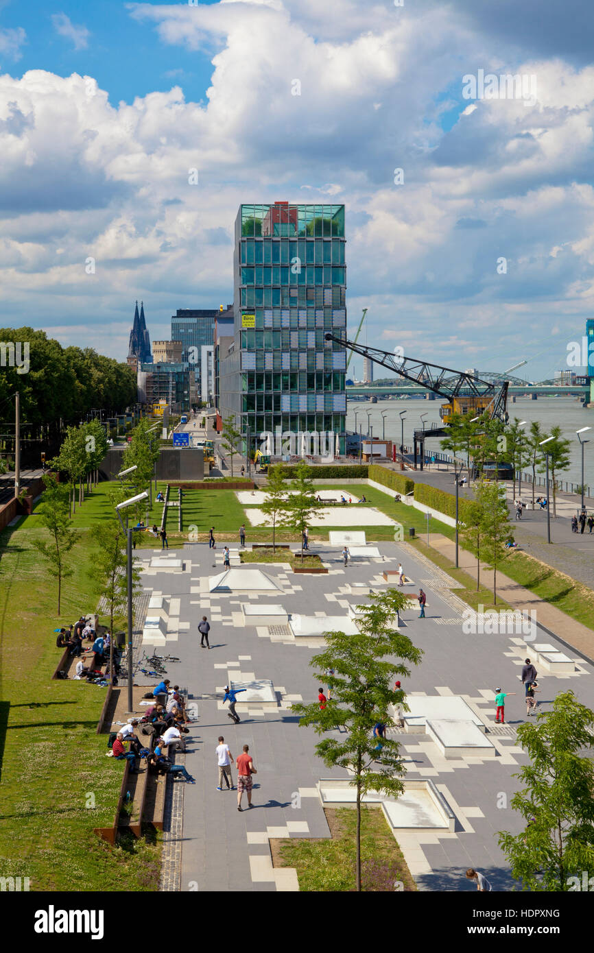 Germany, Cologne, Skate Plaza at the Rheinau harbor, the office building KAP am Suedkai, architects Engel and Zimmermann. Stock Photo