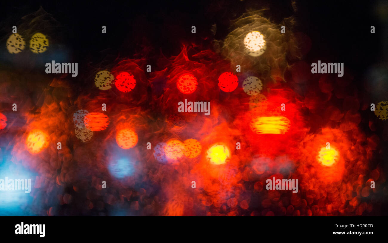 Rain drops on window with street bokeh lights Stock Photo - Alamy