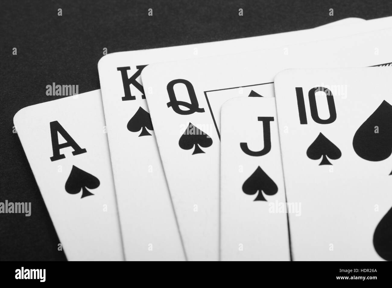 Poker card game with spade straight flush. Black. Horizontal Stock