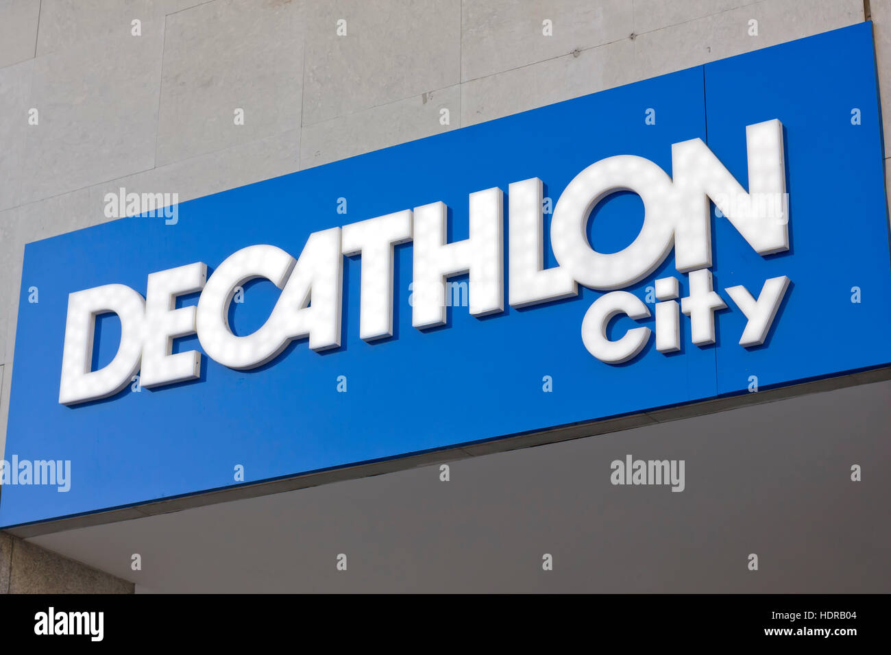 Decathlon company logo neon sign outdoor in Madrid (Spain). Stock Photo