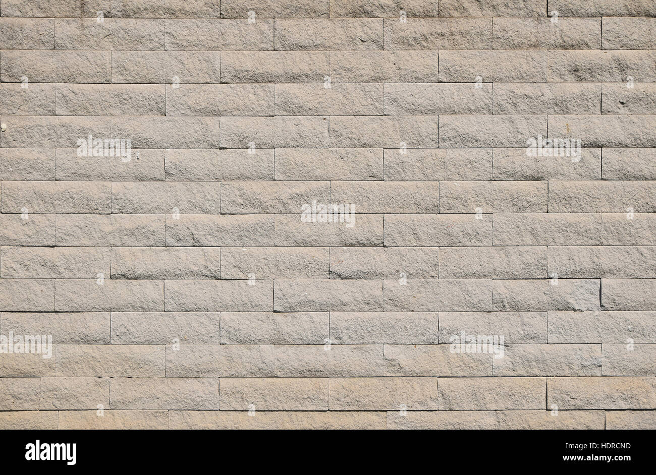 Beige white stone brick shaped tiles exterior wall background texture ...