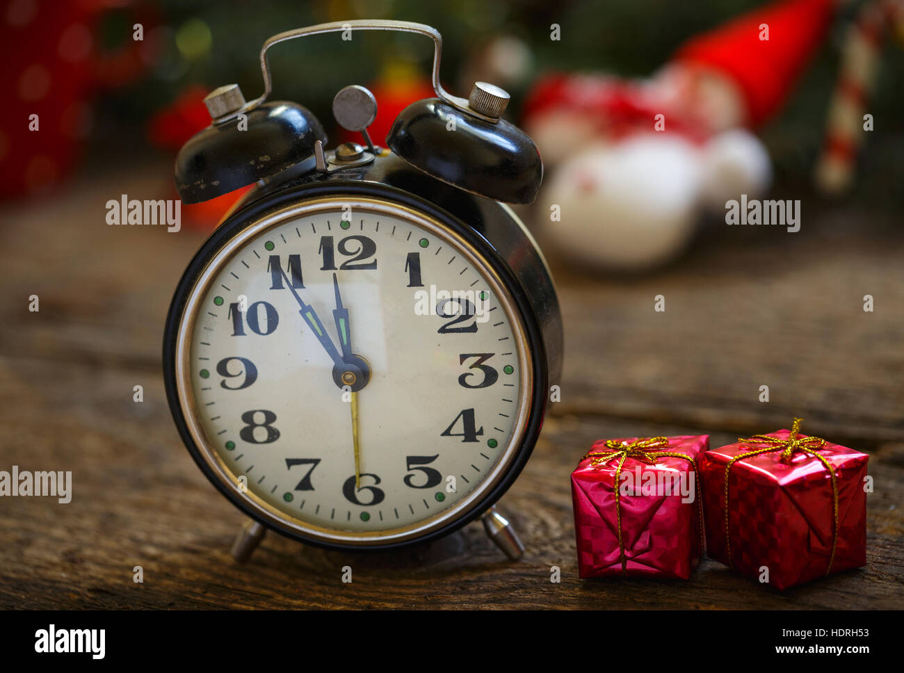 Vintage alarm clock on christmas background. Winter holidays background