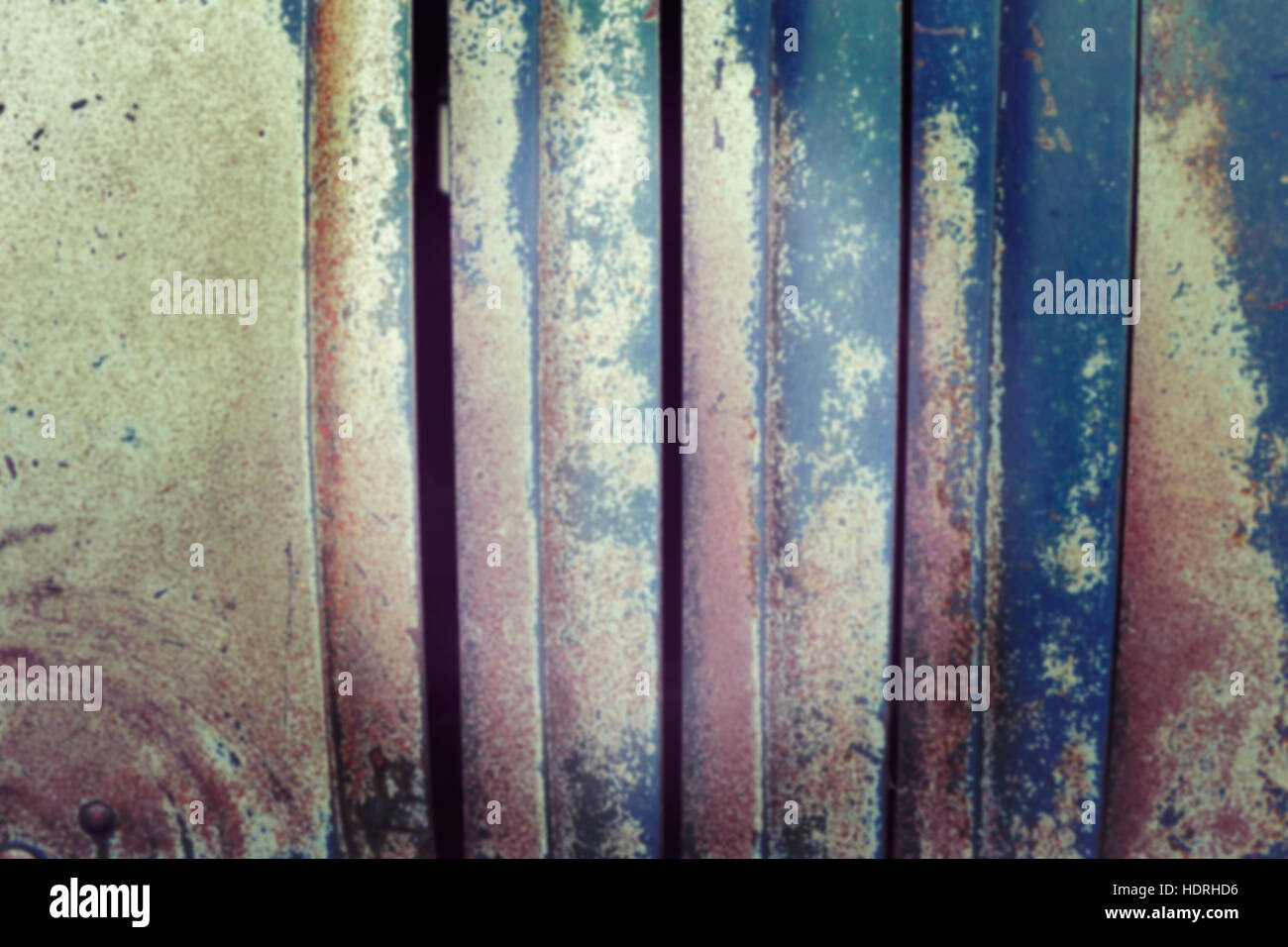 Vintage toned blurred abstract rusty metal background. Stock Photo