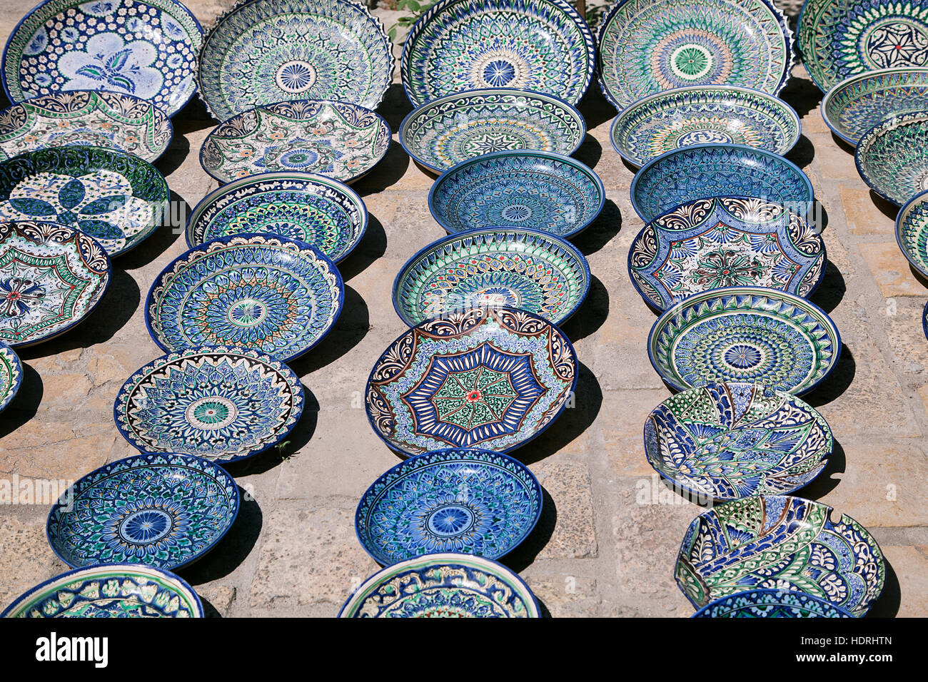 Traditional ceramic dishware in a street market, Uzbekistan Stock Photo